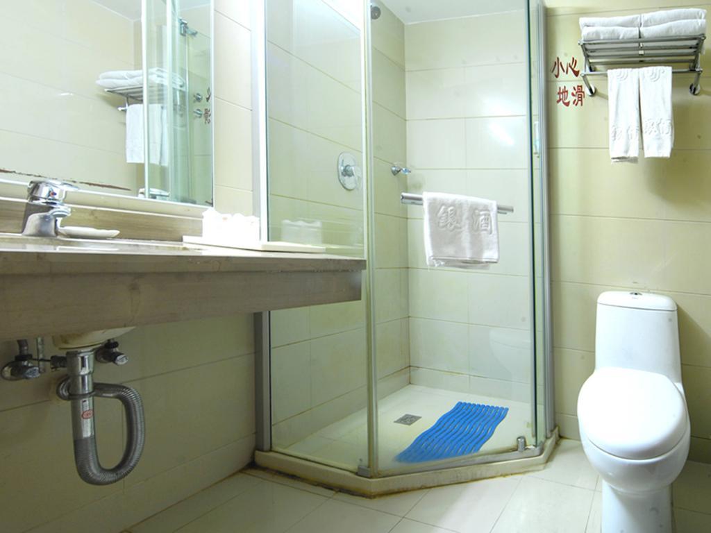 Tangyin Hotel Dalian Quarto foto